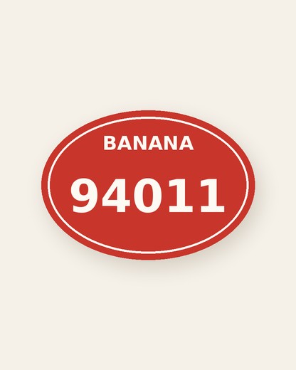 A red oval produce sticker that reads BANANA 94011